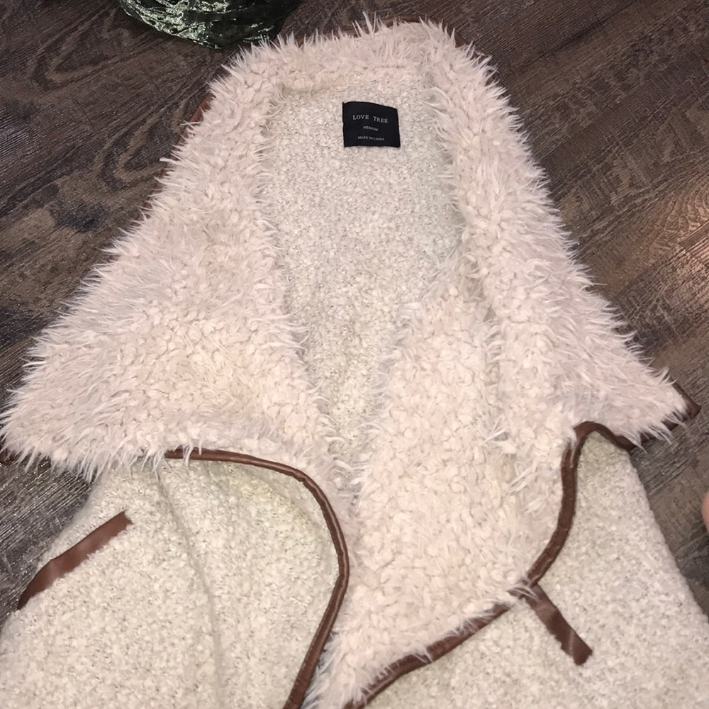 cute fuzzy vest, never worn